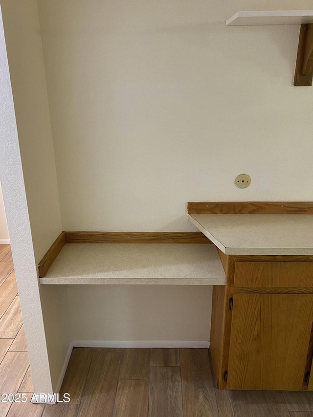 2569 W Berridge Ln Unit D-115, Phoenix, AZ 85017 - interior space with baseboards and wood finished floors