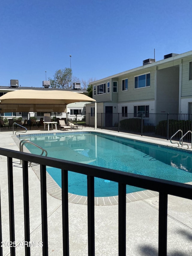 2569 W Berridge Ln Unit D-115, Phoenix, AZ 85017 - pool featuring fence