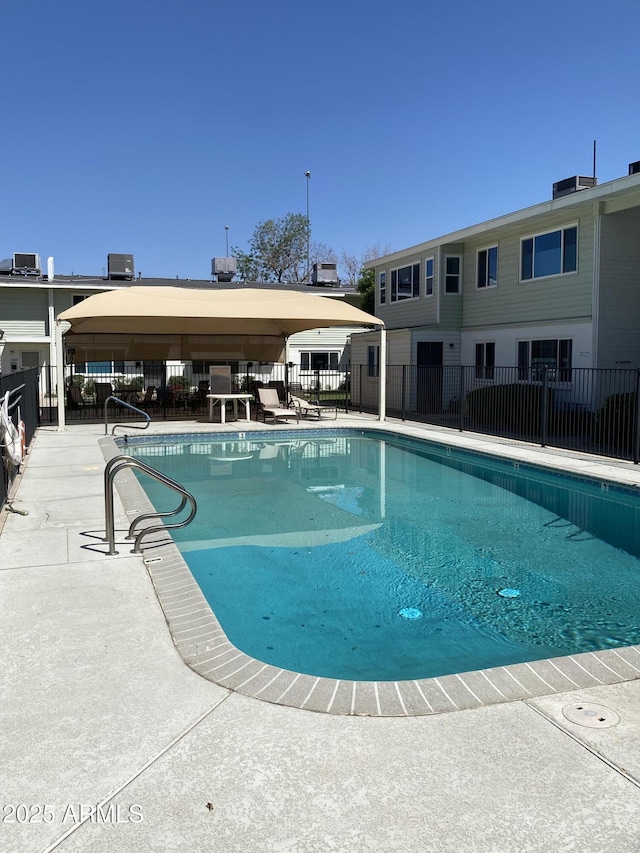2569 W Berridge Ln Unit D-115, Phoenix, AZ 85017 - community pool with a gazebo, a patio area, and fence