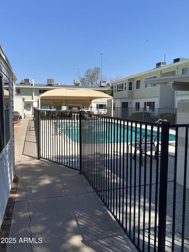 2569 W Berridge Ln Unit D-115, Phoenix, AZ 85017 - pool featuring fence
