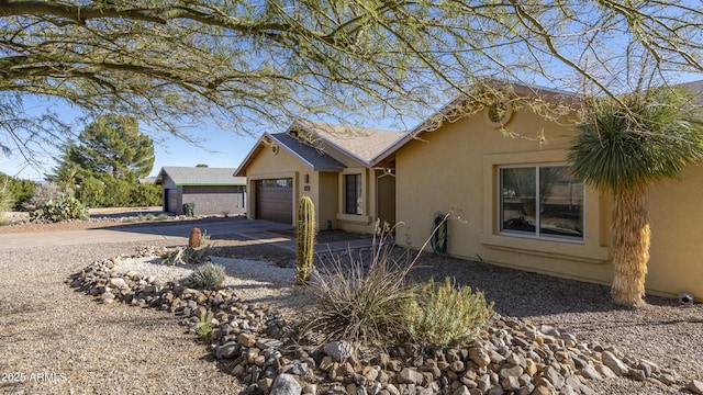 view of front of property with a garage