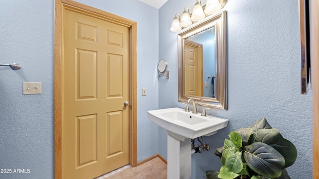 bathroom featuring tile patterned flooring