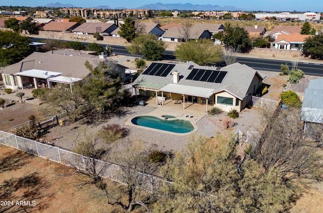 birds eye view of property featuring a mountain view