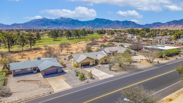 birds eye view of property featuring a mountain view and a residential view