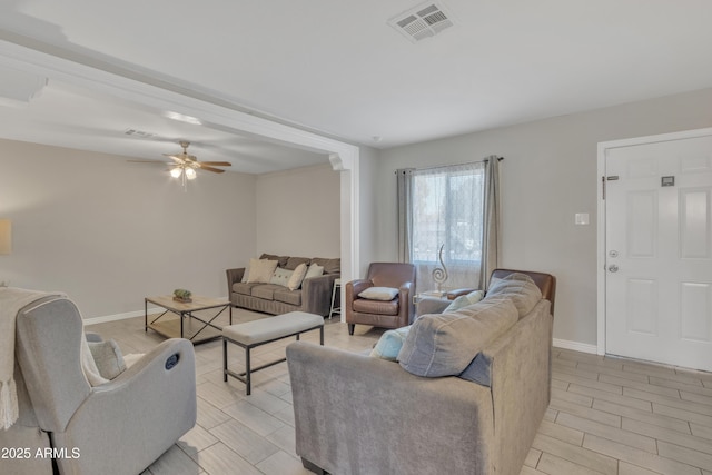 living room with ceiling fan