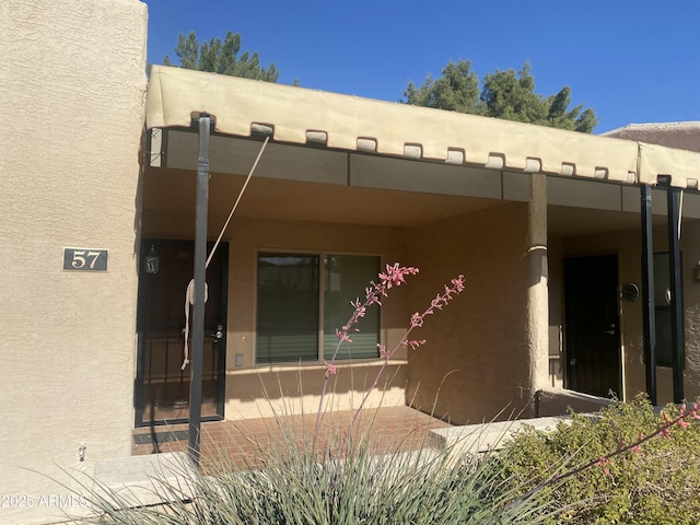 exterior space featuring stucco siding