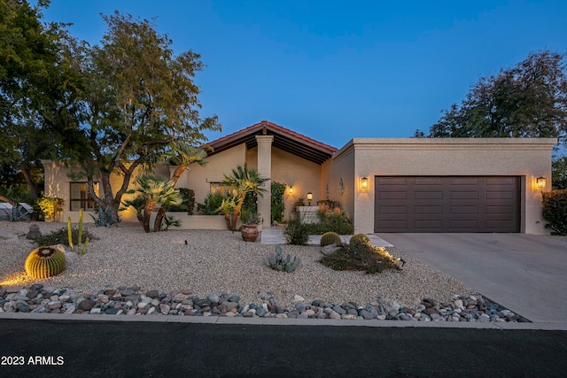 view of front of home with a garage