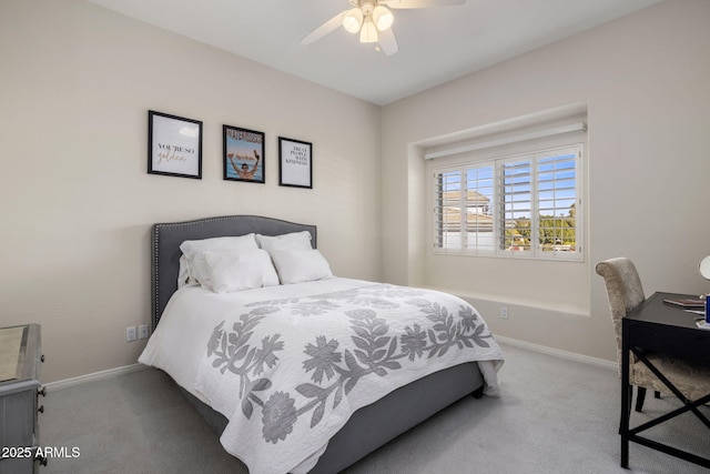 bedroom with ceiling fan and carpet flooring