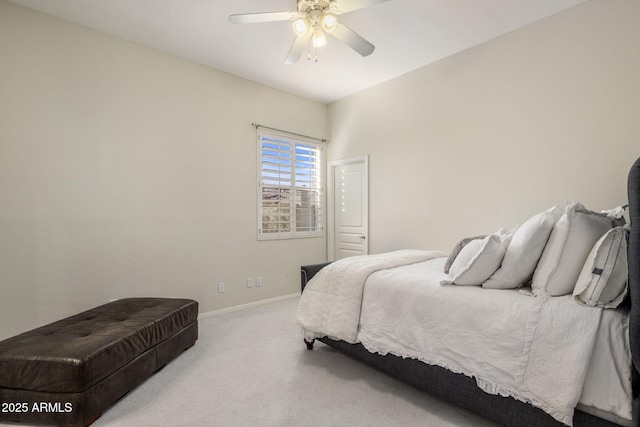 bedroom featuring light carpet and ceiling fan