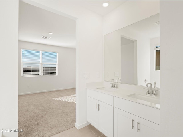 bathroom featuring tile patterned floors and vanity