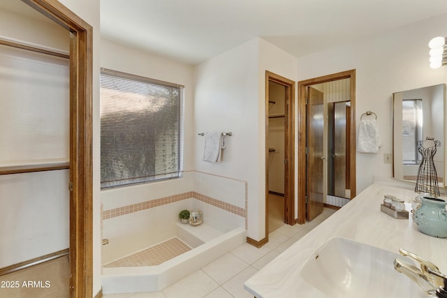 bathroom featuring tile patterned floors and vanity