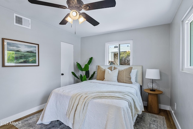 1359 E Nielson Ave, Mesa, AZ 85204 - bedroom with wood finished floors and a ceiling fan