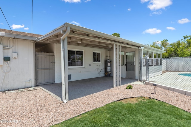 1359 E Nielson Ave, Mesa, AZ 85204 - view of patio with a gate and water heater