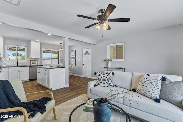 1359 E Nielson Ave, Mesa, AZ 85204 - living room with wood finished floors, ceiling fan, and recessed lighting