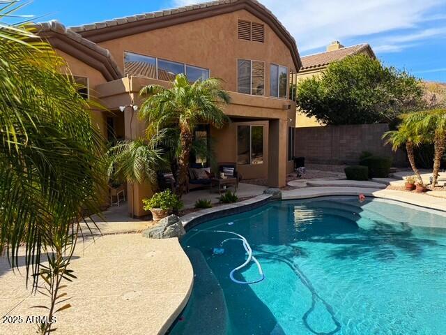 view of swimming pool featuring a patio