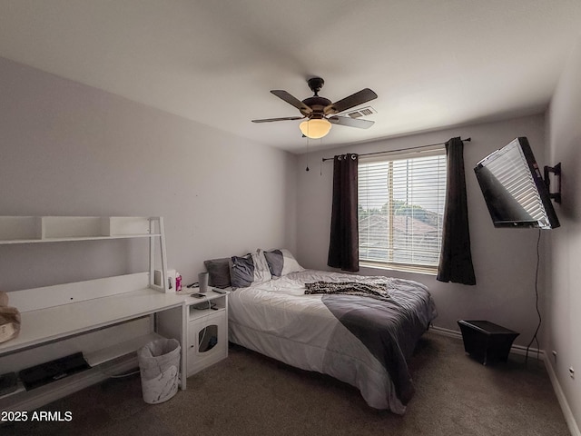 bedroom featuring a ceiling fan, baseboards, and carpet flooring