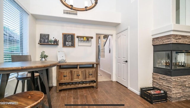 dining space featuring a fireplace