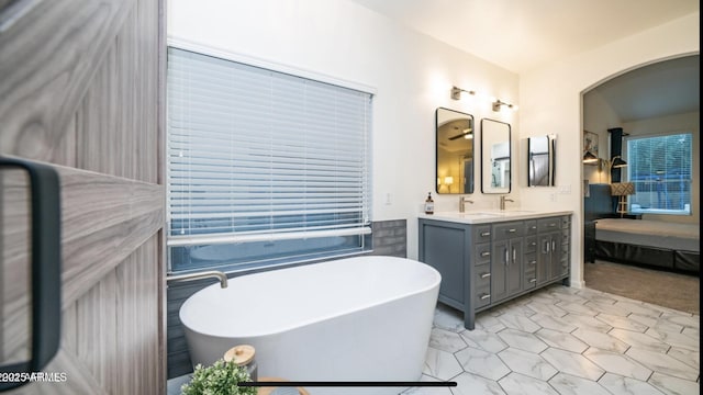 bathroom featuring a bathtub and vanity