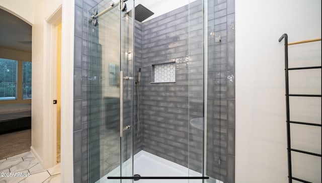 bathroom featuring an enclosed shower