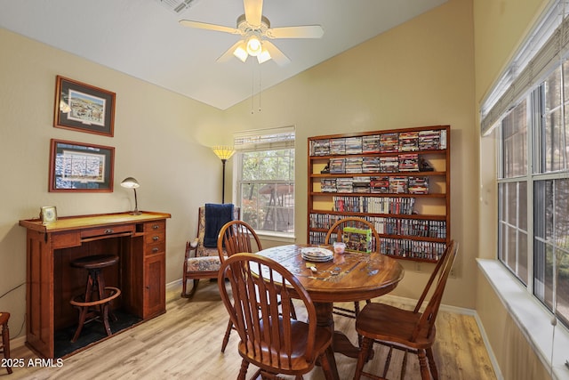 709 W Forest Dr, Payson, AZ 85541 - dining area with light wood-type flooring, baseboards, ceiling fan, and lofted ceiling