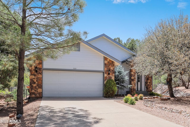 709 W Forest Dr, Payson, AZ 85541 - view of front of home with a garage, driveway, and stone siding