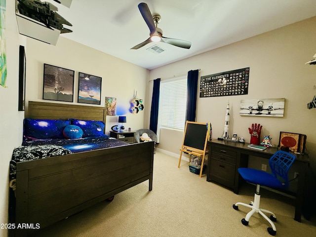 carpeted bedroom featuring ceiling fan, visible vents, and baseboards