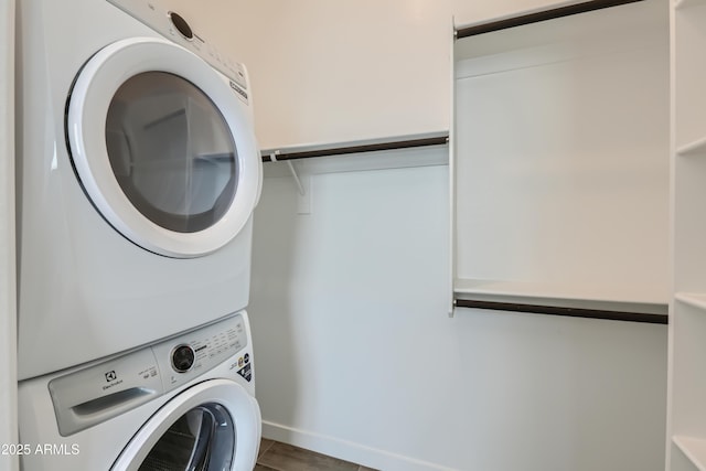 laundry room featuring laundry area and stacked washer and dryer