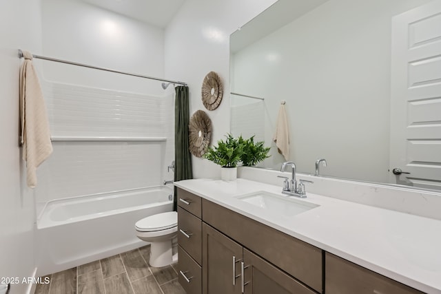 full bath with vanity, shower / tub combo, toilet, and wood finish floors