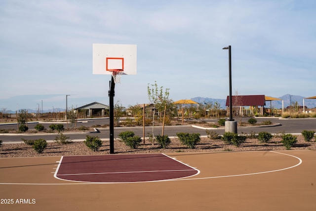 view of basketball court featuring community basketball court and a mountain view