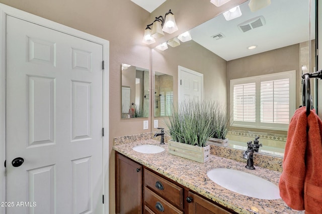 bathroom featuring vanity