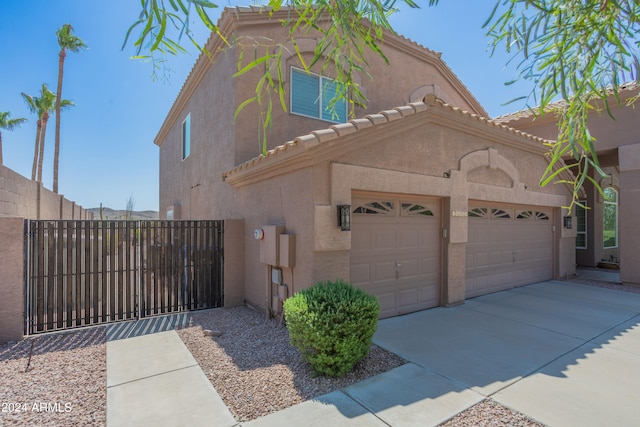 view of front of house with a garage