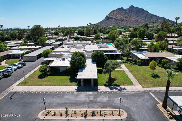 drone / aerial view featuring a mountain view