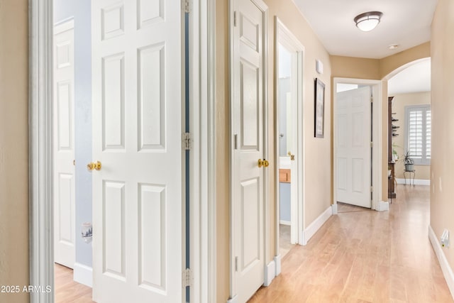 hallway featuring light hardwood / wood-style floors