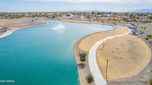 birds eye view of property with a mountain view