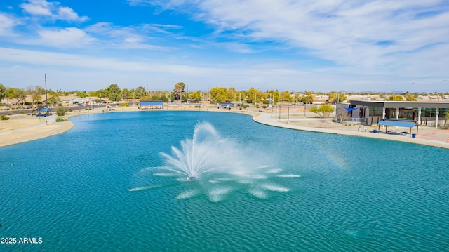 view of pool with pool water feature