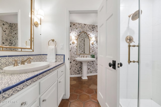 bathroom featuring tile patterned flooring, double sink, and tasteful backsplash