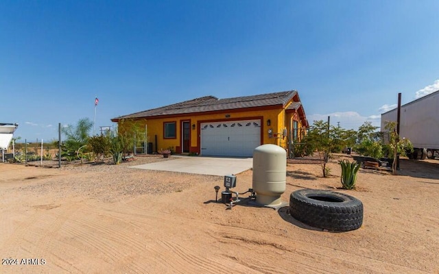 view of front of property featuring a garage