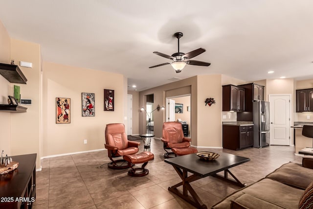 living area featuring tile patterned floors, recessed lighting, baseboards, and ceiling fan