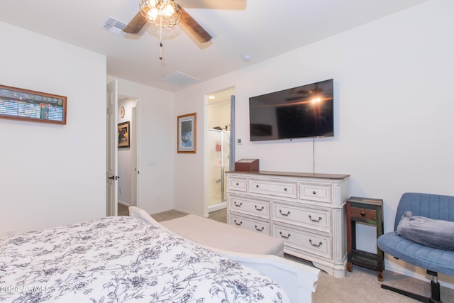 bedroom with baseboards, visible vents, ceiling fan, ensuite bathroom, and carpet floors