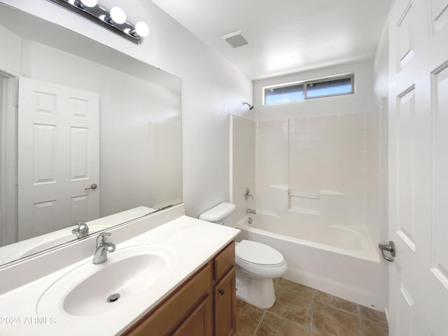 full bathroom featuring tile patterned flooring, vanity, toilet, and bathtub / shower combination