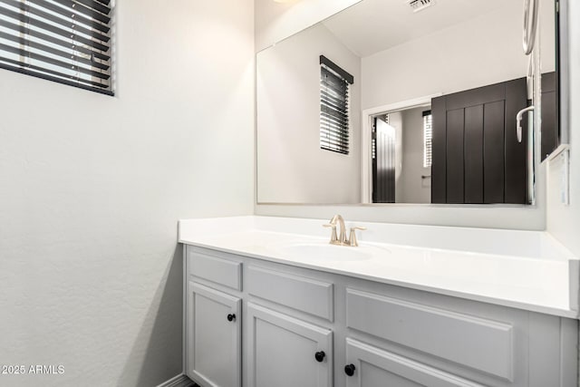 21972 N 97th Gln, Peoria, AZ 85383 - bathroom featuring visible vents and vanity