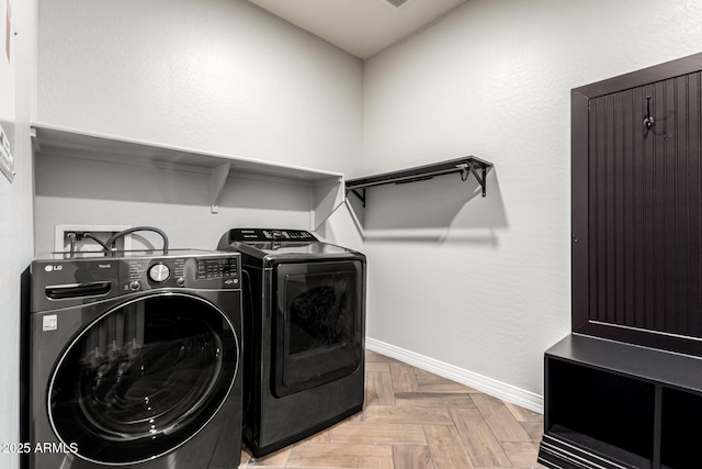 21972 N 97th Gln, Peoria, AZ 85383 - laundry room featuring washer and dryer, laundry area, and baseboards