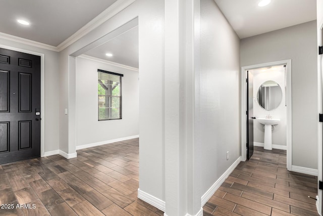21972 N 97th Gln, Peoria, AZ 85383 - hallway with baseboards, ornamental molding, and dark wood finished floors
