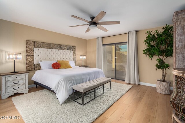 bedroom featuring access to outside, ceiling fan, and light hardwood / wood-style floors