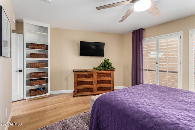 bedroom with ceiling fan and wood-type flooring