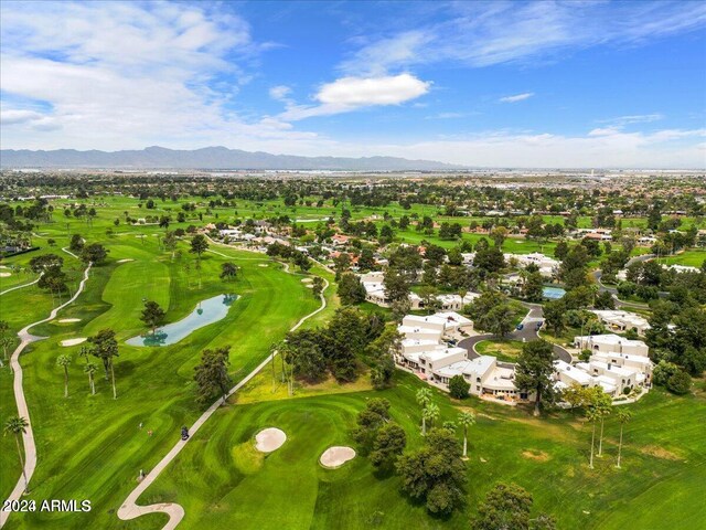 birds eye view of property featuring a water and mountain view