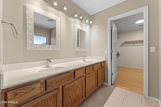 bathroom featuring hardwood / wood-style floors and vanity