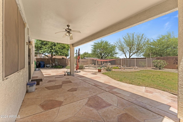 view of patio / terrace featuring ceiling fan