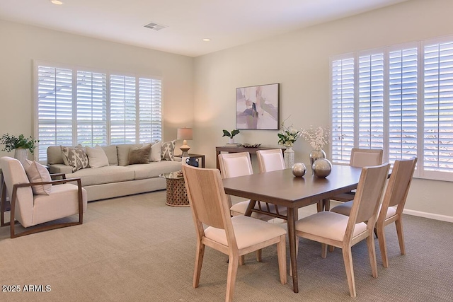 carpeted dining area featuring recessed lighting and visible vents