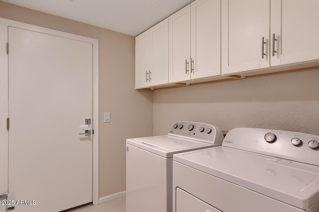 laundry area featuring cabinet space and washing machine and dryer